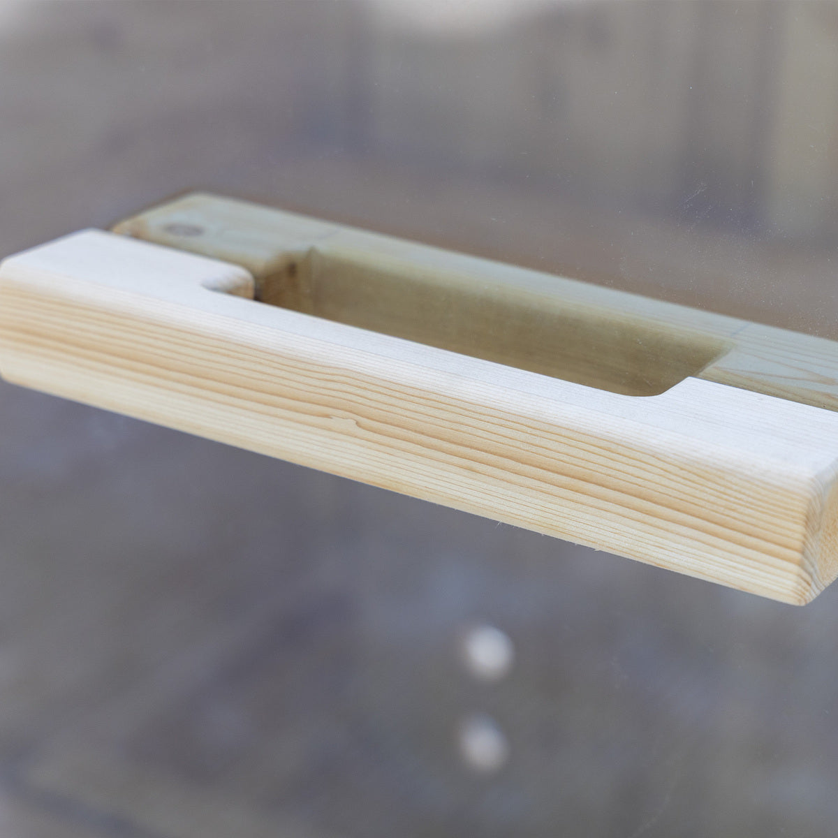 Auris One outdoor cedar sauna, bench edge and glass detail