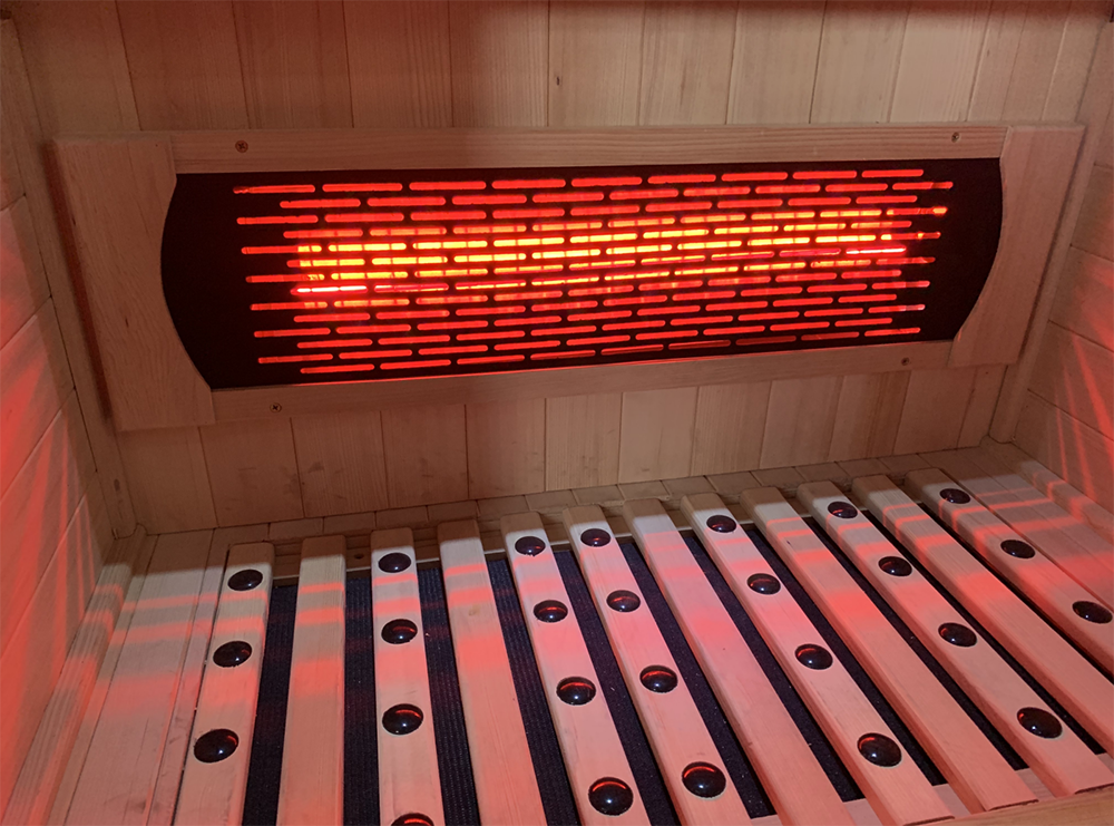 Lumin Three infrared sauna, ceiling heater element and slatted bench detail